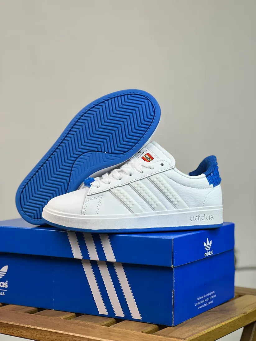 Adidas blancos con azul online